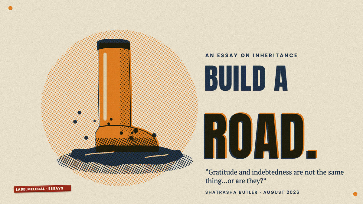 An orange rubber boot standing sunk to the ankle in a dark mound of mud, splashes around it, printed in two inks beside the words Build a road.